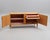 Classic and timeless sideboard in light honey birch, made in Sweden in 1940s. This piece is designed in the style of the...