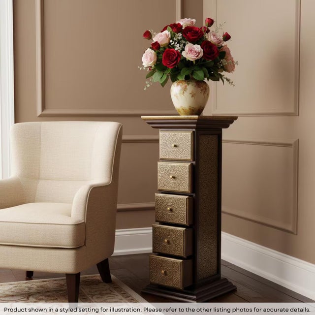 Dimensions: 11” W x 11” D x 27” H Sculptural, functional, and rich in artisan detail — this striking wooden pedestal is...