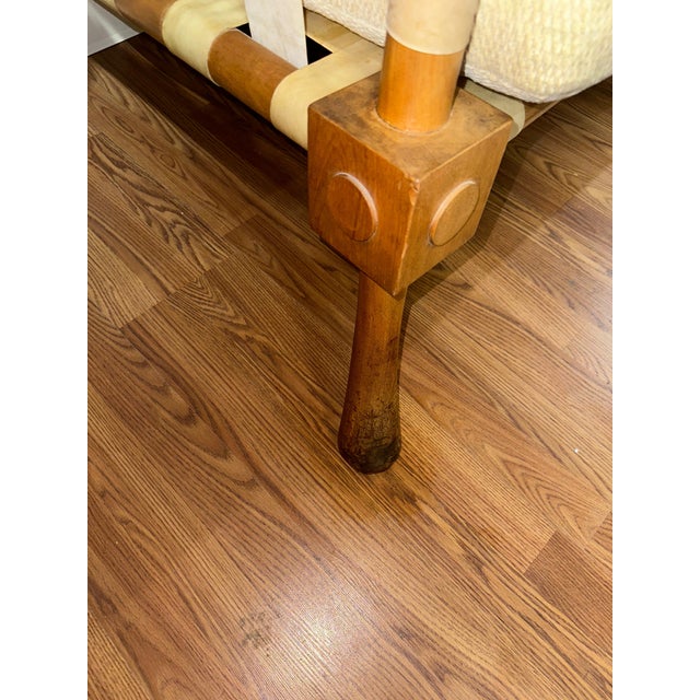 A rare, likely custom ordered Sofa or Settee, designed by T.H. Robsjohn Gibbings with a bleached Walnut frame and Vellum...