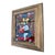 A vintage reverse-painted glass folk art depicting Christ holding a Eucharistic chalice, rendered in a vibrant palette of...