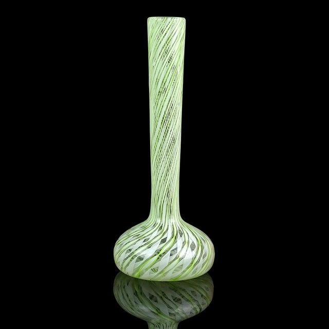 Beautiful vintage Murano hand blown green and white ribbons Italian art glass soliflore flower vase. The piece is...