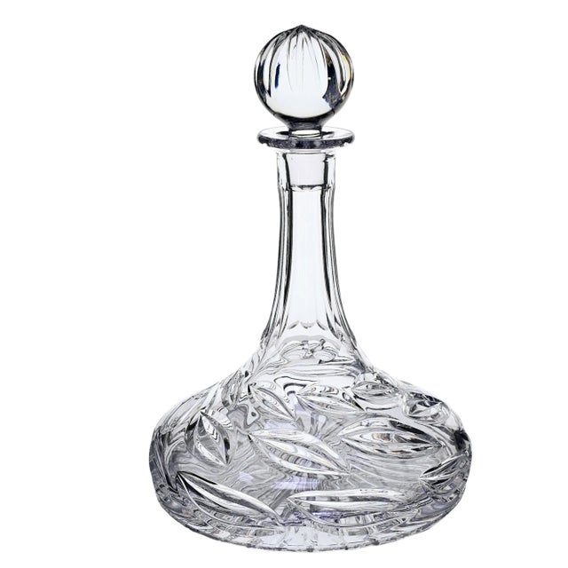 This is a beautiful tall decanter in an intricately cut leaf pattern that encircles this weighty decanter. This is a very...