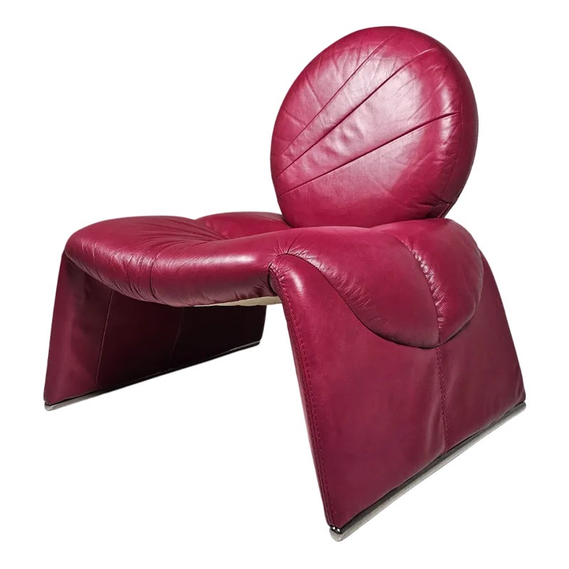 Red leather chair with unique design