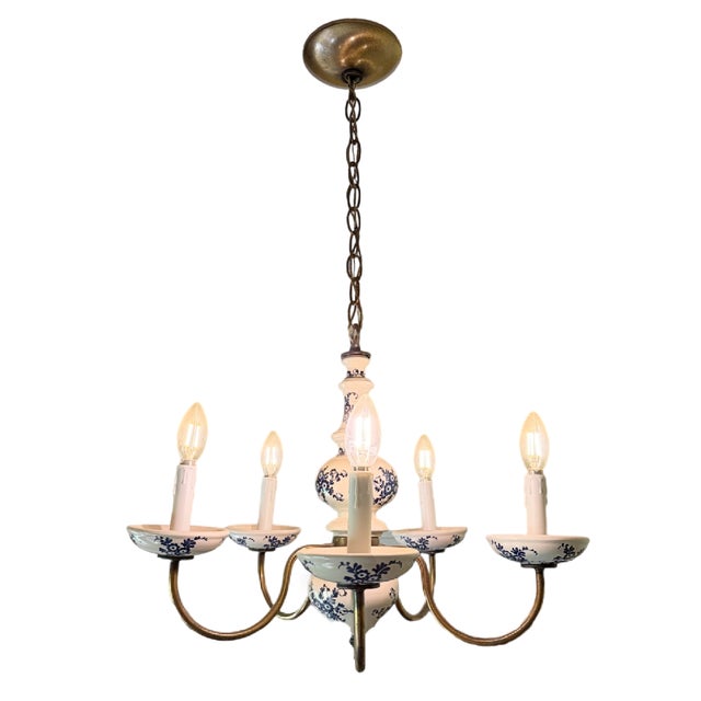 An elegant mid-century Dutch Flemish-style 5-arm chandelier, beautifully crafted from solid brass and authentic hand-...