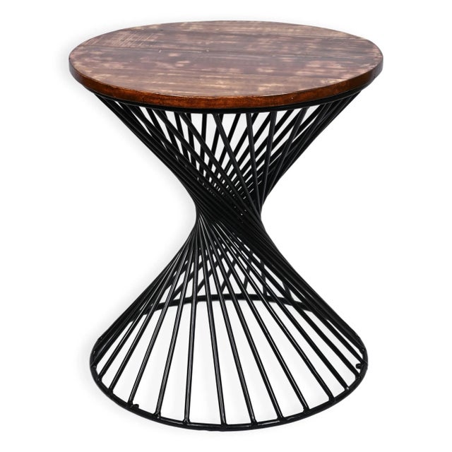 Stunning spiral-shaped Iron accents interweave effortlessly with the textured rustic wood making for a focal point of any...