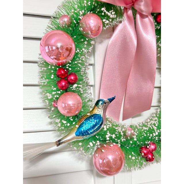 One-of-a-kind Christmas wreath handcrafted from vintage and antique holiday components, including an antique green...