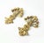 A pair of decorative early C19th gilt wood appliqués. This piece is attributed to the mentioned designer/maker. It has no...