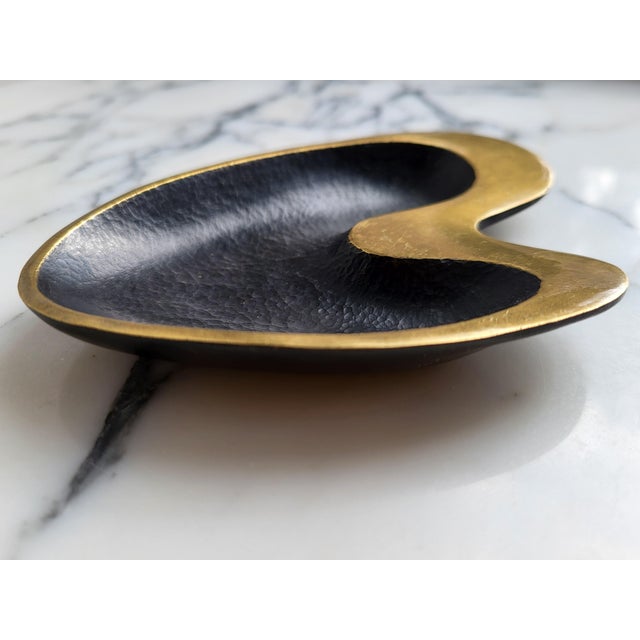 Top vintage condition, lightest age related patina, beautiful organic modernist form, a 1950s original. This piece has an...