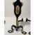 This stylish set of English andirons were acquired from a Palm Beach estate and they are fabricated in wrought iron and...