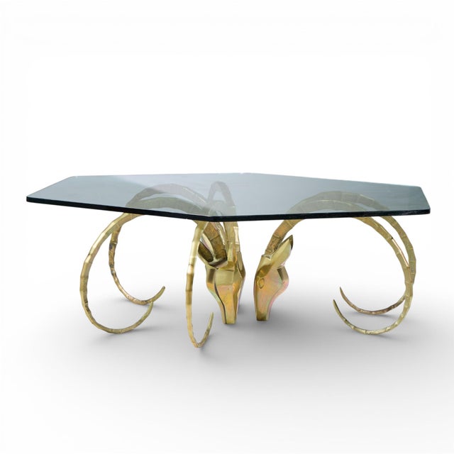 Alain Chervet Mid Century Brass Ibex Glass Top Coffee Table This coffee table measures: 61.5 wide x 53.75 deep x 18.75...