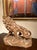 This 19th century big scale Italian animalier sculpure features a lion striding forward on a root-wood base, snarling with...