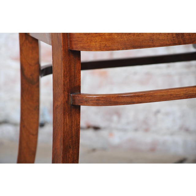 This set of four chairs originates from the 1920s and stylistically belongs to the elegant Art Deco period. Their...