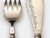 Exceptional Japanese Fish Serving Set. Bright cut chased pattern on blade and tines, hand chased "Dragon" motif on...