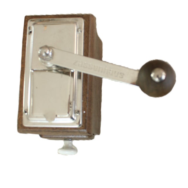 1950's-1940's antique German "Zassehaus" coffee grinder with hand crank. We love it's original pretty white porcelain pull...