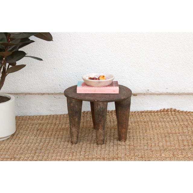 A unique piece of African art, this vintage Nupe table from Nigeria is a must-have for collectors and enthusiasts of Nupe...