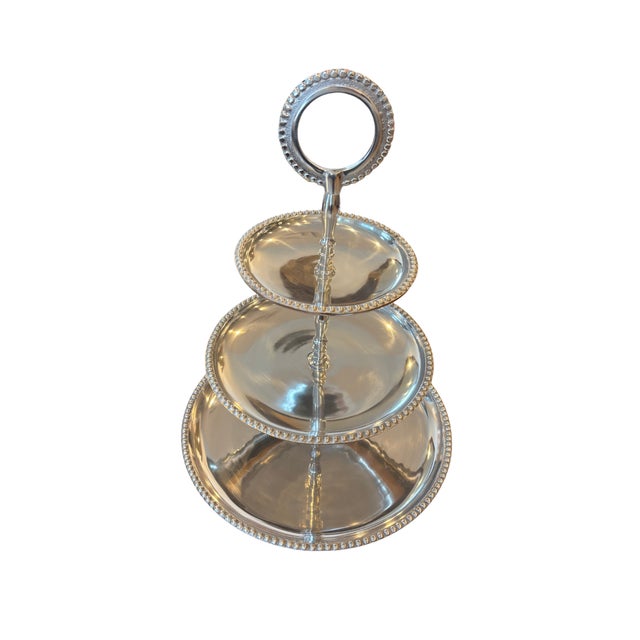 The Polished 3-Tier Beaded Cake Stand with Circle Handle is a stunning addition to any home or event. Crafted with...
