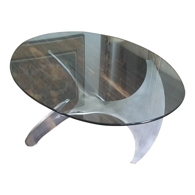 Vintage 1960's coffee table in the form of a propeller made of aluminum and glass table top. The table style design of...