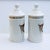 A pair 19th century Neoclassical porcelain apothecary jars with elegant hand painted decoration and lettering. "AGARIC;...