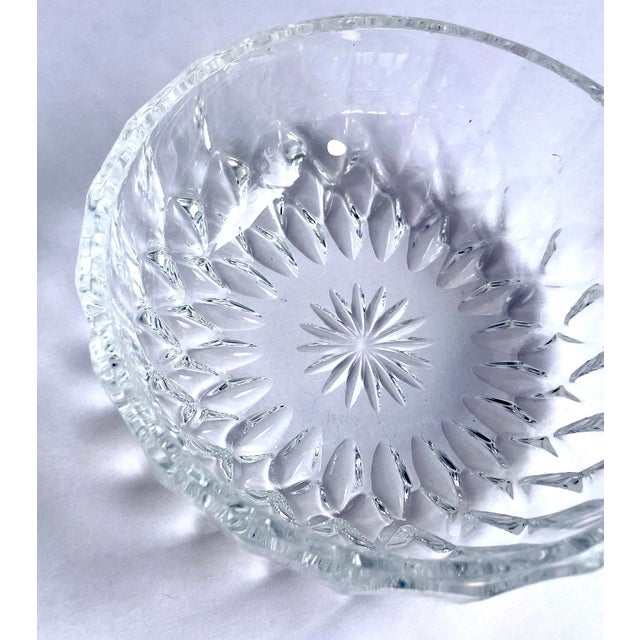 This is an antique set of four in the discontinued but timeless cut crystal “Imperial” pattern with star centered design...