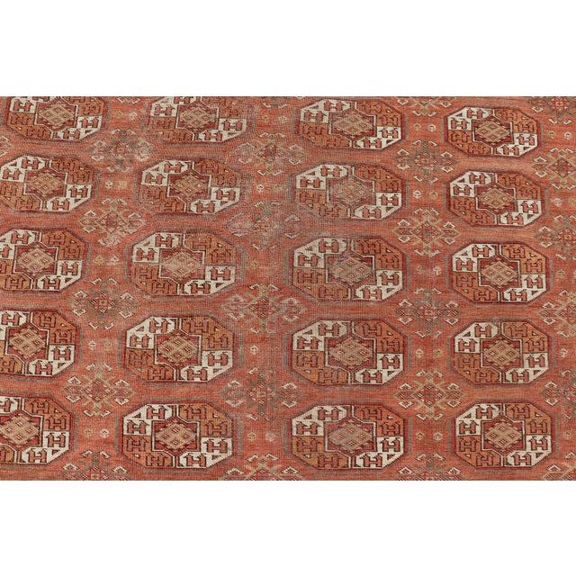 Early 20th Century Antique Tekke Rug With Gul Motif in Rich Coral and Ivory Tones 8'0 X 18'10 For Sale - Image 5 of 12