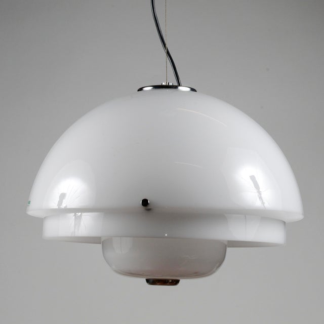 This harveiluce chandelier by guzzini s.p.a. Is an iconic piece of modern italian design that embodies the sophisticated...