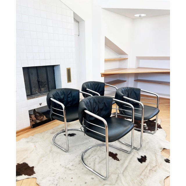 Gorgeous Pair of Italian soft leather and polished chrome accent chairs in the style of Giotto Stoppino. Fantastic...