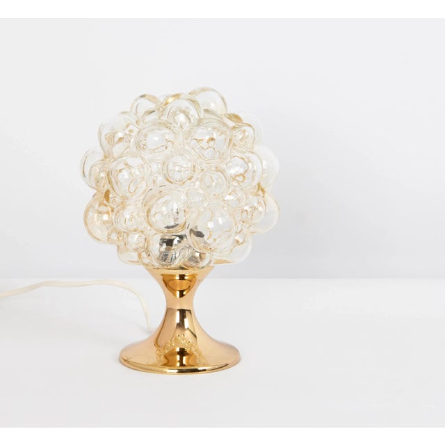 One of six amber bubble glass table lights made in germany. Very good condition. Cleaned, well-wired and ready to use....