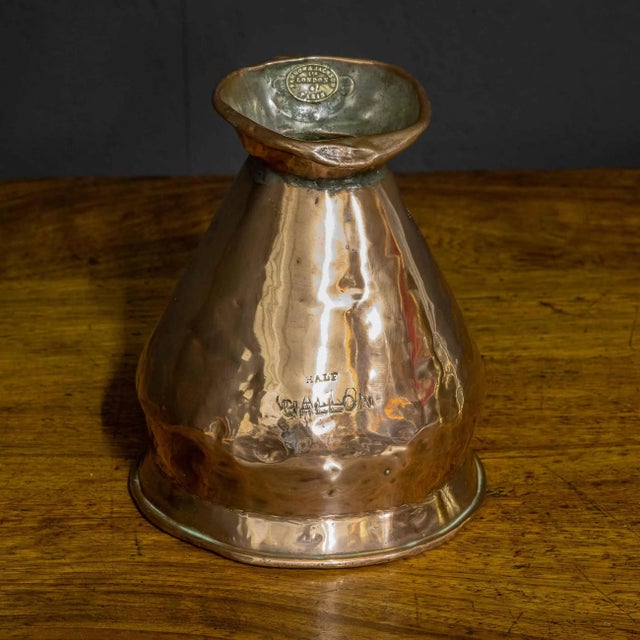 A good well shaped Mid Victorian half gallon harvest flagon. Copper with an original tinned interior (prevents verdigris...