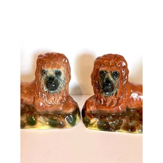 This is a great pair of late 19th century, Staffordshire lions. Both lions are in overall very good to excellent condition.