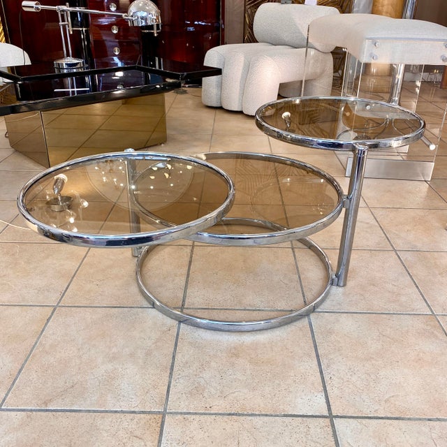Coffee Table with Two Modular Shelves in Chrome and Smoked Glass, Italy, 1970s, in Very Good conditions. Designed 1960 to...