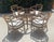 Rare & gorgeous rattan dining set by luxury brand McGuire of San Francisco! Featuring 4 chairs and a matching table from...