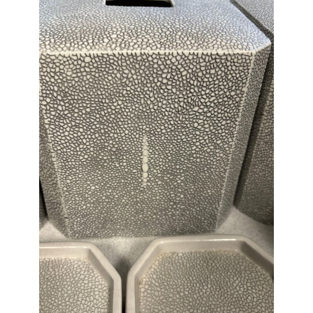 Porcelain embossed with a shagreen-look (stingray) detail, this lovely set is a great addition to any bathroom....