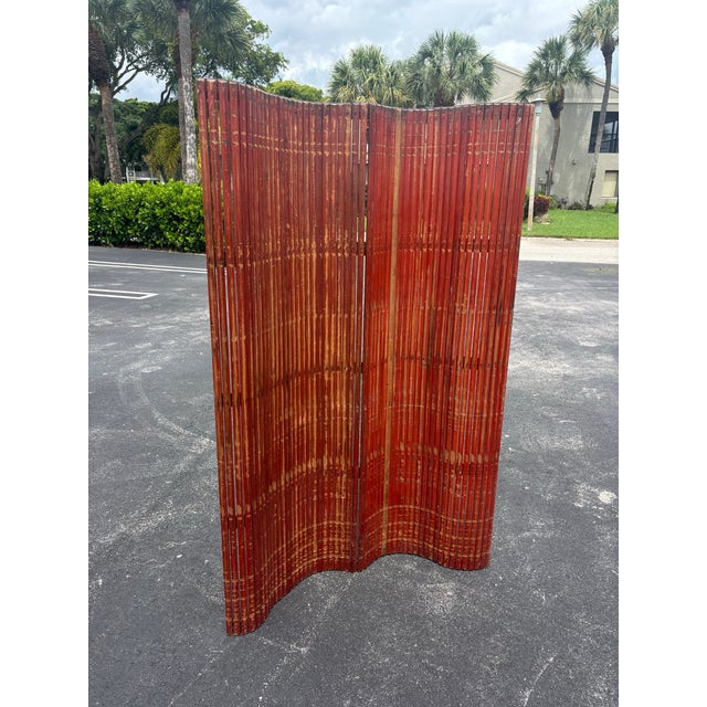 Striking vintage American flexible room divider, circa 1940s, constructed from numerous narrow hardwood slats secured to...