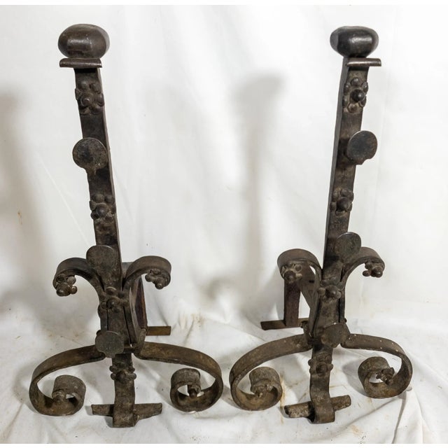 We are selling this heavy and early pair of blacksmith made iron Andirons. These andirons are early and may be late gothic...