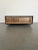 Linear-driven design. Clean casing of black mango wood frames warm natural oak, featuring both vertical and horizontal...