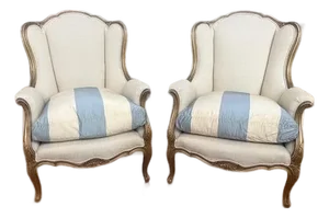 Pair of Early 20th Century Louis XV–Style Wingback Bergère Chairs With Gilt Frames