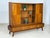 For sale is a beautiful vintage highboard in very good condition. This piece of furniture impresses with its elaborate...