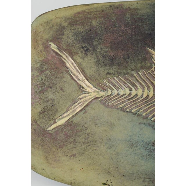 Hans Hedberg, Swedish ceramicist, Biot, France. Unique colossal elongated platter featuring a fish skeleton motif. Glazed...