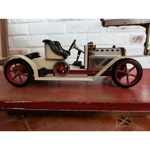 This steam car was manufactured by the mamod company in the 1970s. It was an excellent toy for those who liked steam-...