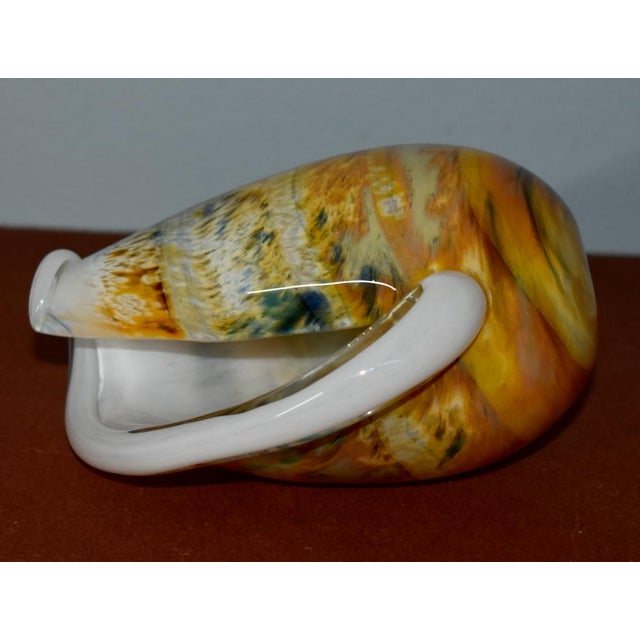 Vintage (1980's) Decorative Conch Shell is Made of Art Glass. In Neutral Multicolor Shades. The Designer is probably Hal...