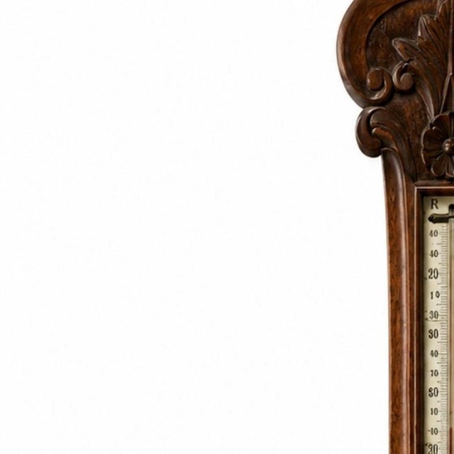 English barometer. English; 20th century; made of oak wood. Dimensions: 87 cm x 27 cm.