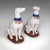 This is a pair of vintage Greyhound figures. An Italian, ceramic seated dog statue or decorative bookends, dating to the...