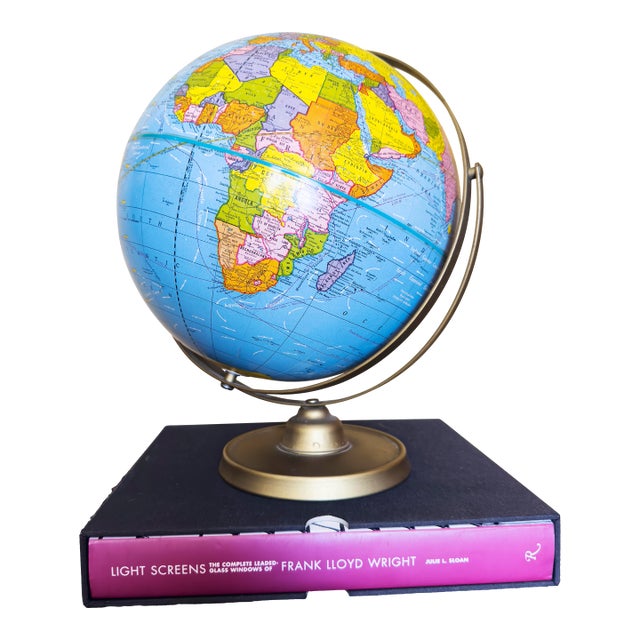 Vintage 10.5-inch Scholastic World Globe by The George F. Cram Co., Inc., manufactured in Indianapolis, Indiana. The globe...