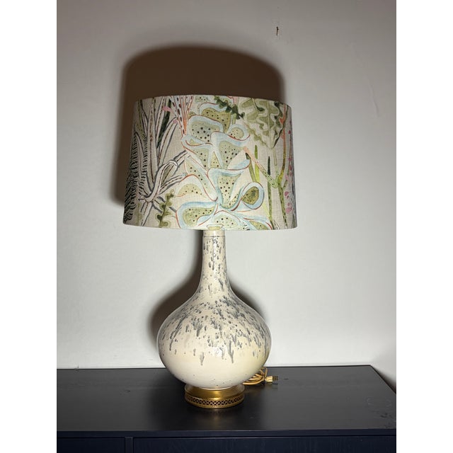 Pair of mid century splatter glaze lamps with custom botanical shades. Made in the 1950s. Wired and working.