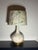 Pair of mid century splatter glaze lamps with custom botanical shades. Made in the 1950s. Wired and working.