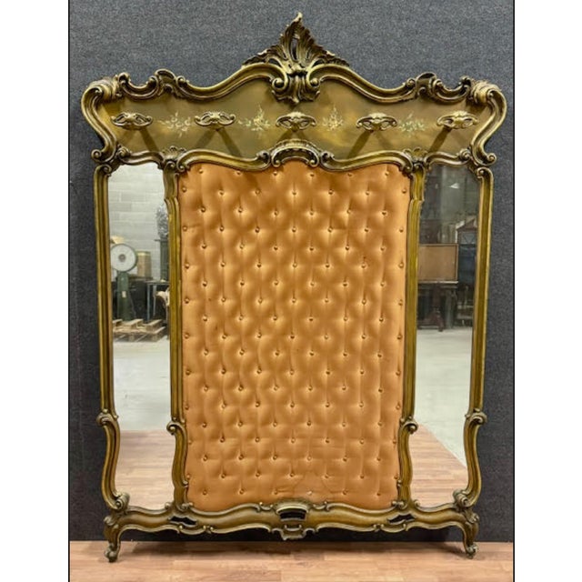 Italian-made wall coat hanger in carved wood, patinated gold lacquer and hand-painted floral decorations; tripartite front...