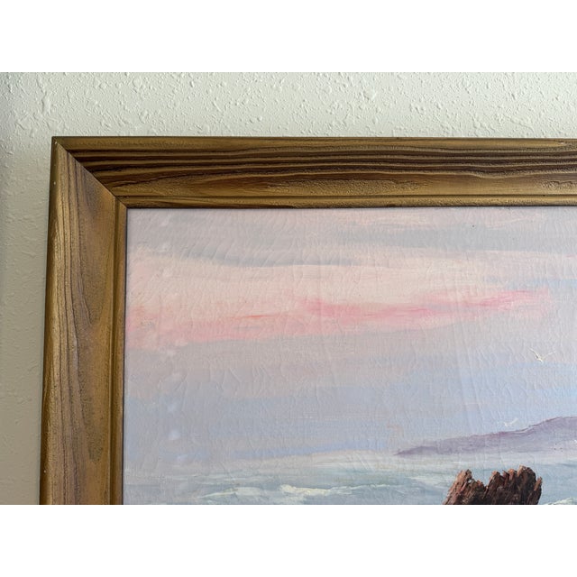 Original vintage oil painting on canvas depicting a dramatic coastal seascape with waves crashing against rocky shoreline....