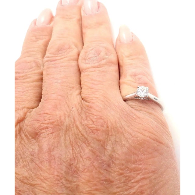 Contemporary Cartier Platinum .40ct VVS1/G Diamond Solitaire Engagement Ring, size 4.75 For Sale - Image 3 of 12