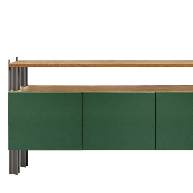 Defined by Robert Stadler's Flexor system, this sideboard combines green polished-lacquered wood containers with a...