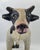 An original decorative cow figurine made of papier-mâché in the folk art style, dating from the second half of the 20th...